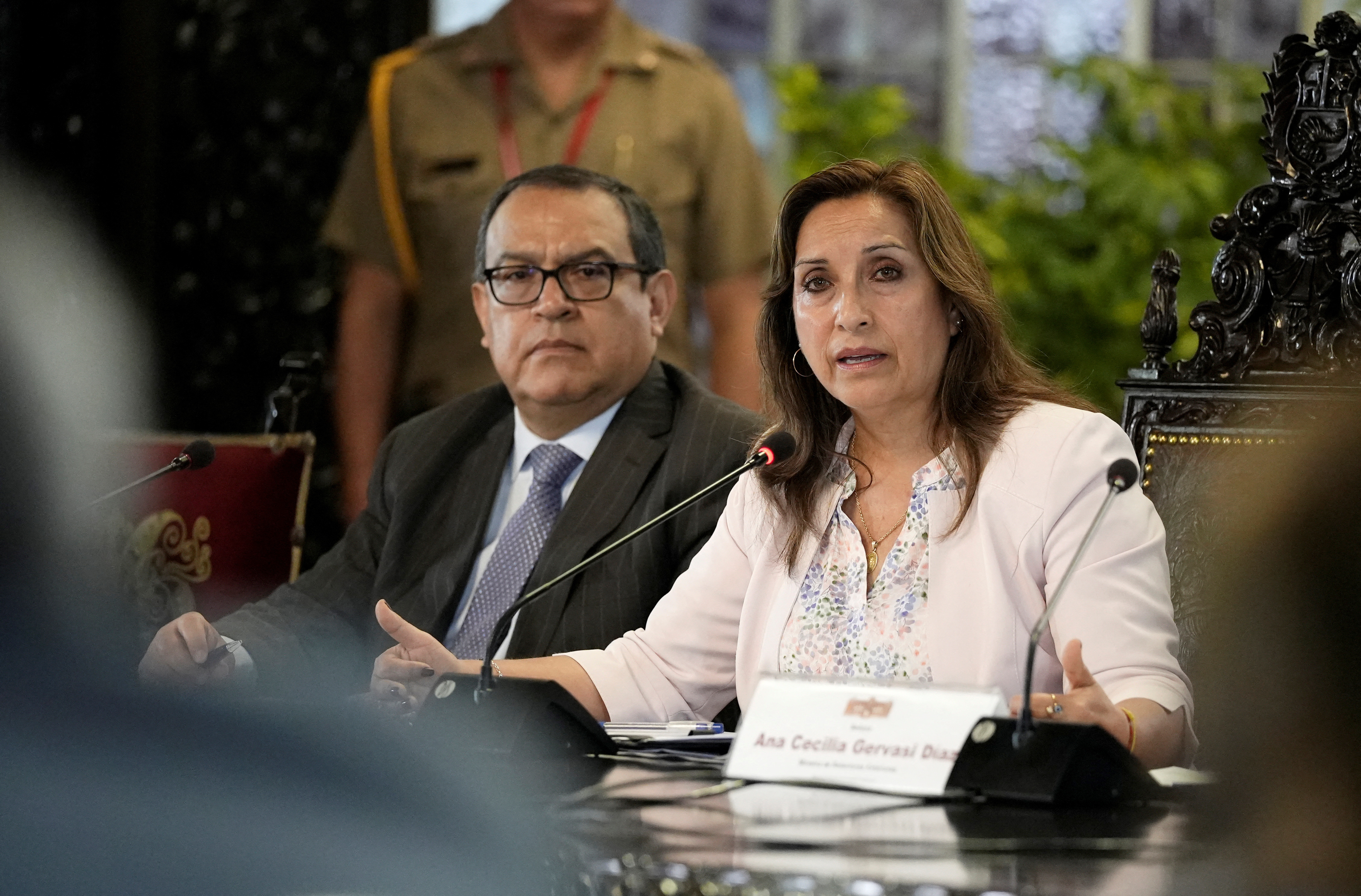 Peru's President Dina Boluarte, flanked by Prime Minister Alberto Otarola, addresses the media, in Lima, Peru December 29, 2022. REUTERS/Angela Ponce