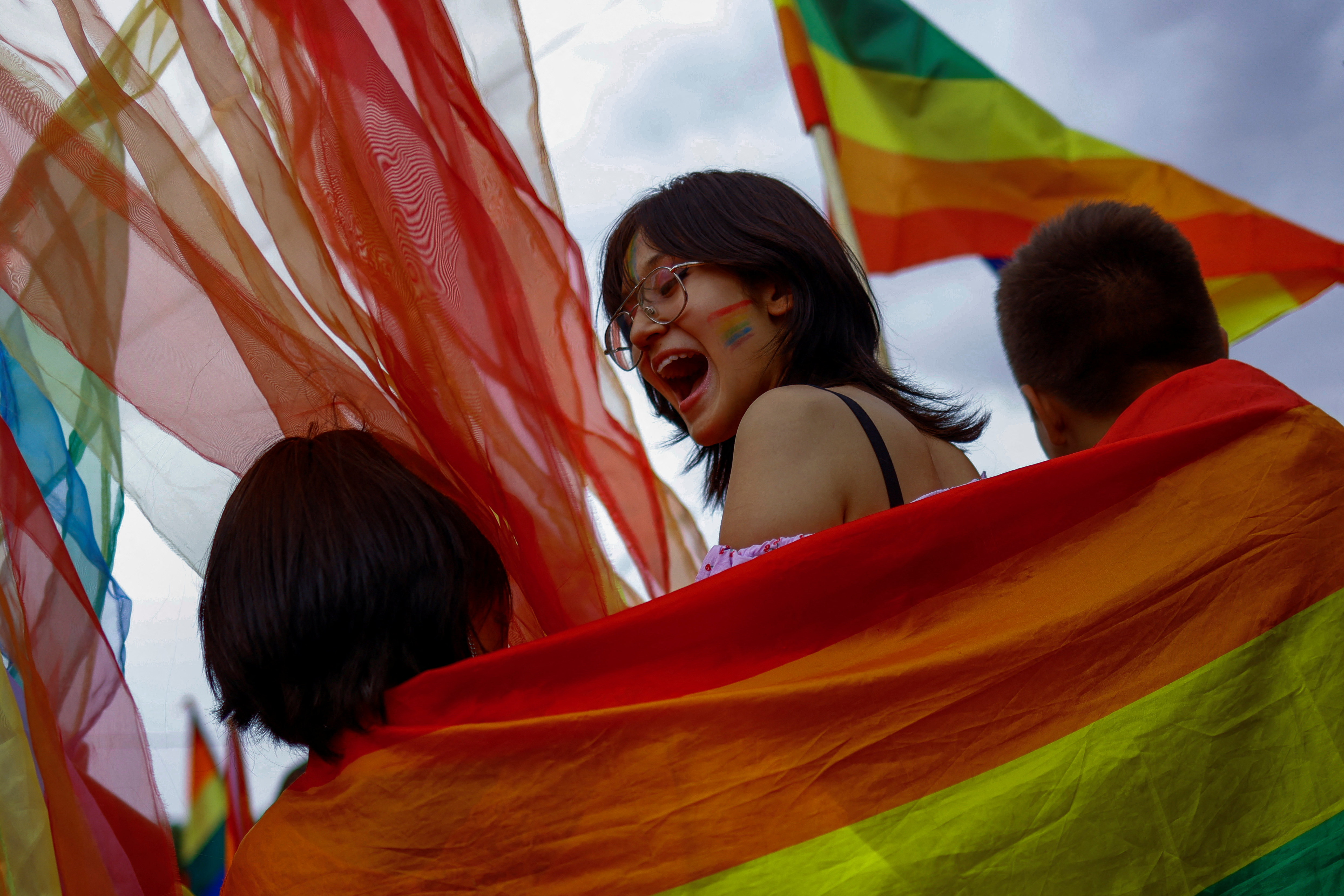 People attend a march as part of the LGBT+ pride celebrations, in Ciudad Juarez, Mexico June 19, 2022. REUTERS/Jose Luis Gonzalez