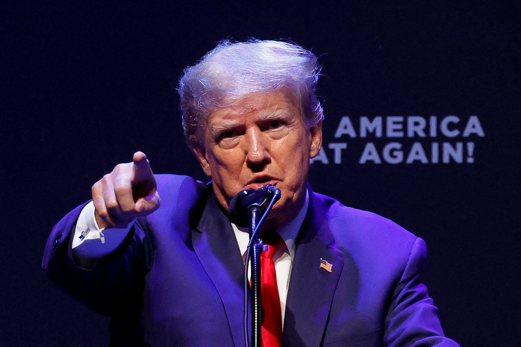 FILE PHOTO: Former U.S. President Donald Trump delivers remarks on education as he holds a campaign rally with supporters, in Davenport, Iowa, U.S. March 13, 2023. REUTERS/Jonathan Ernst/File Photo