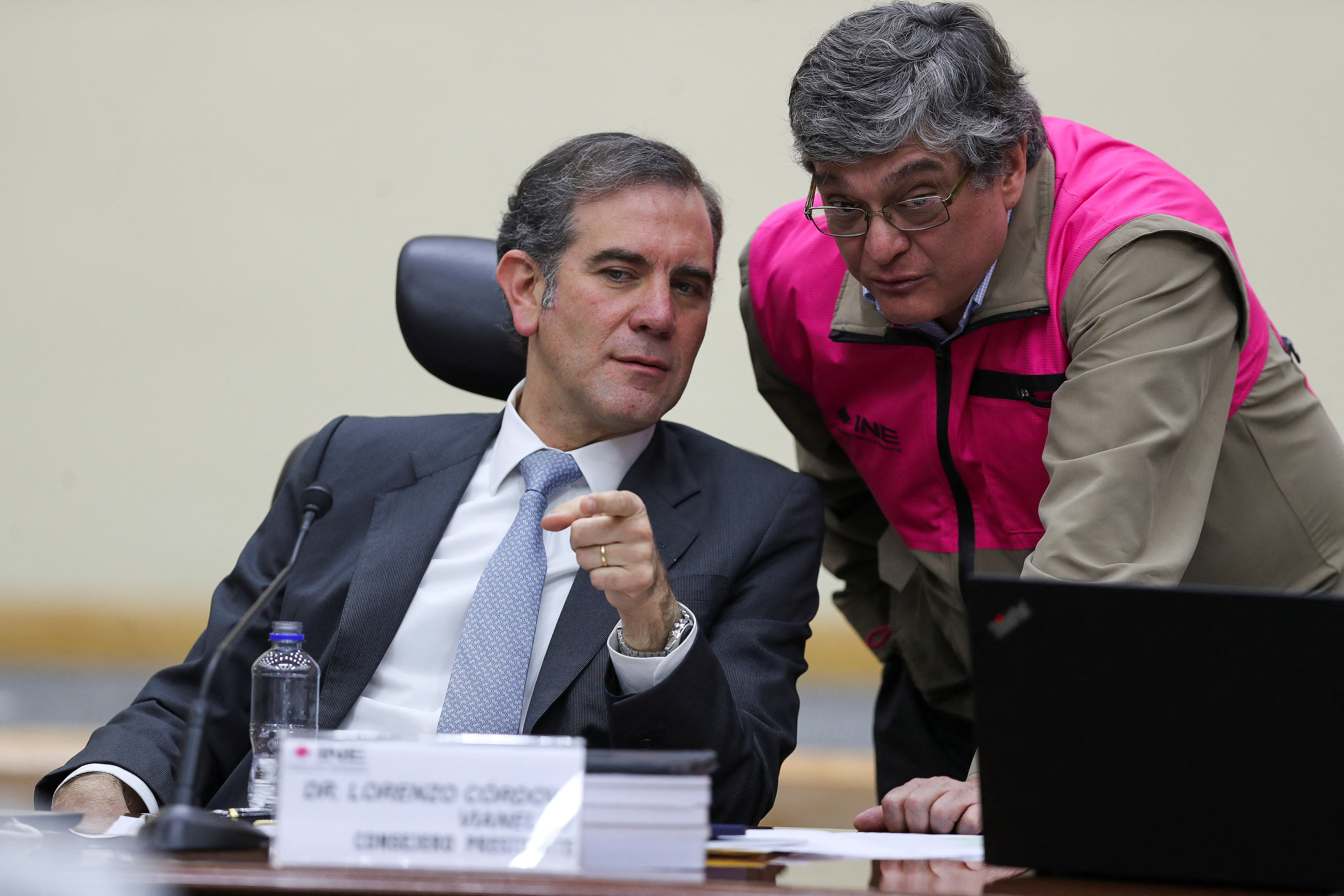 Lorenzo Cordova Vianello, president of the National Electoral Institute (INE), speaks with INE electoral advisor Uuc-kib Espadas Ancona during a general council session of the INE in Mexico City, Mexico. March 3, 2023. REUTERS/Raquel Cunha